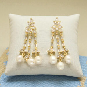 The Noura Dangle Pearl Earrings